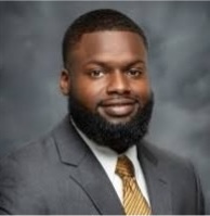 Professional headshot of Dr. Marcus Brumfield